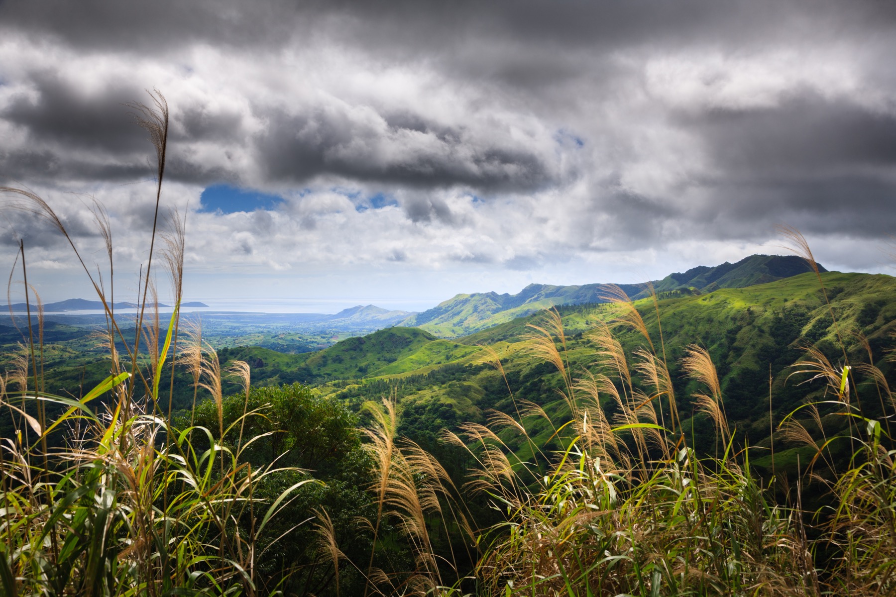 Green Fiji highlands and coastline